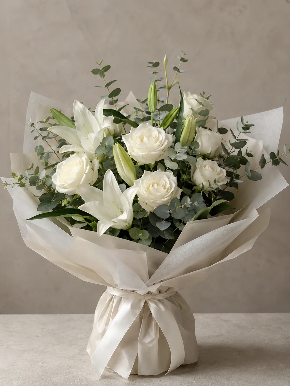 Condolence bouquet in white and green tones